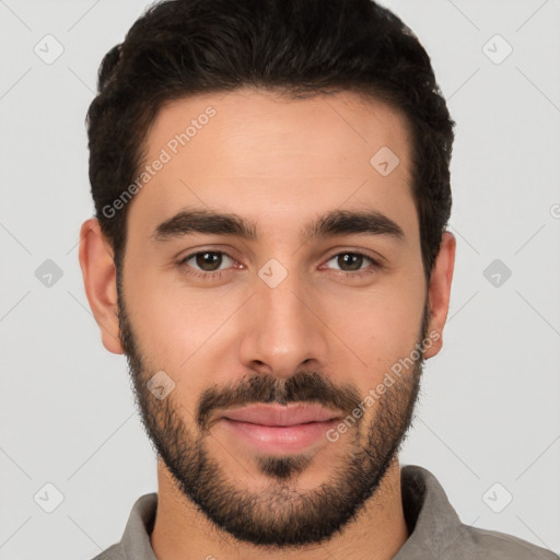 Joyful white young-adult male with short  black hair and brown eyes