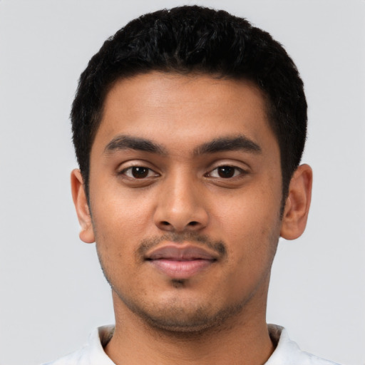 Neutral latino young-adult male with short  black hair and brown eyes