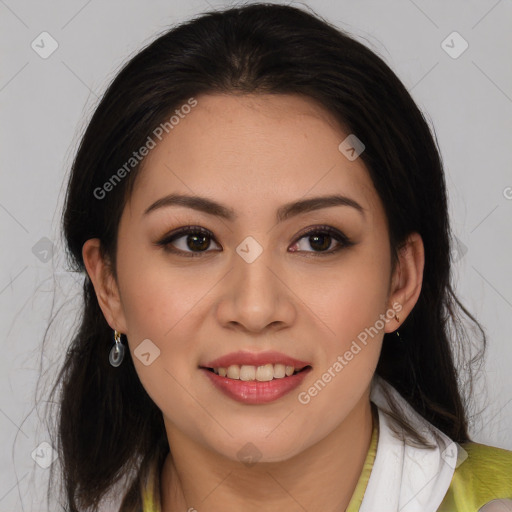 Joyful latino young-adult female with long  brown hair and brown eyes