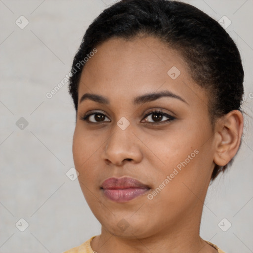 Joyful latino young-adult female with short  brown hair and brown eyes