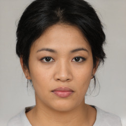 Neutral asian young-adult female with medium  brown hair and brown eyes