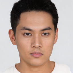 Neutral asian young-adult male with short  brown hair and brown eyes