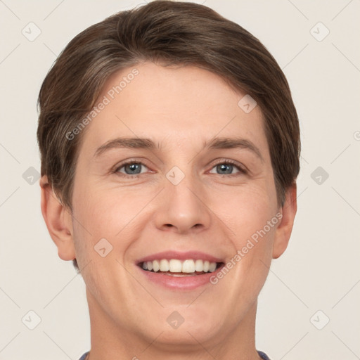 Joyful white young-adult female with short  brown hair and grey eyes