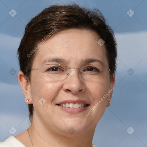 Joyful white adult female with short  brown hair and brown eyes