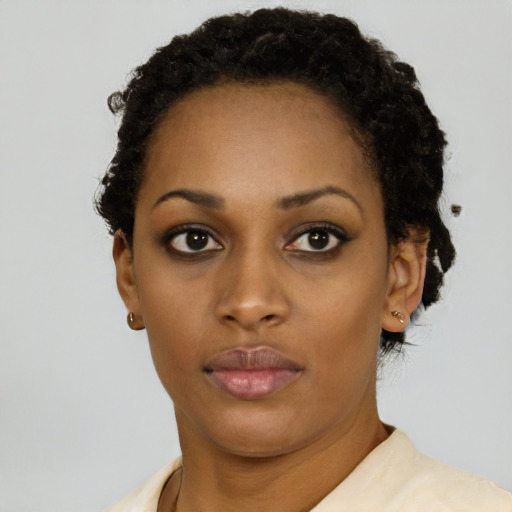 Neutral black young-adult female with short  brown hair and brown eyes