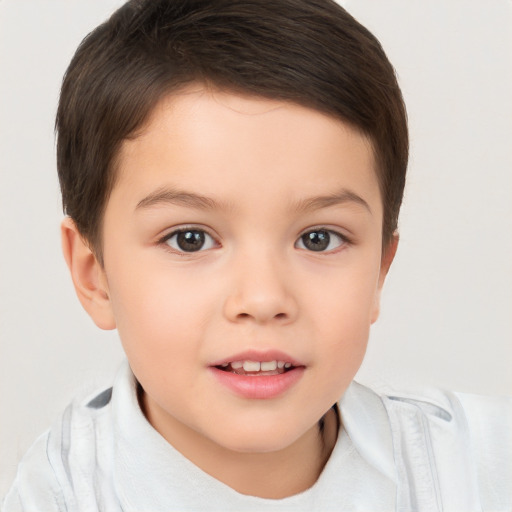 Joyful white child female with short  brown hair and brown eyes