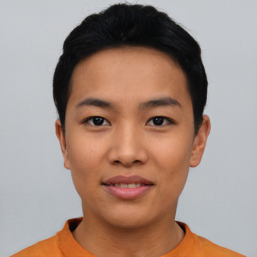 Joyful asian young-adult female with short  black hair and brown eyes