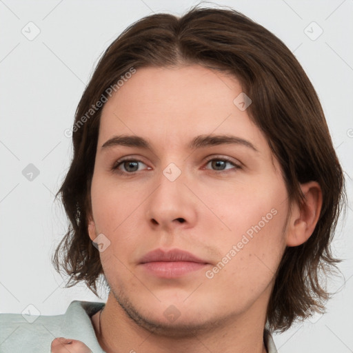 Neutral white young-adult female with medium  brown hair and brown eyes