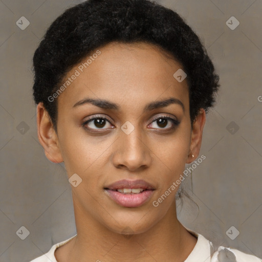 Joyful black young-adult female with short  black hair and brown eyes