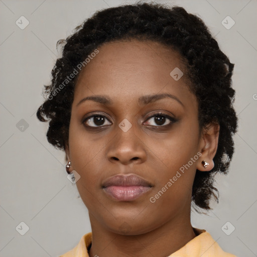 Neutral black young-adult female with medium  brown hair and brown eyes