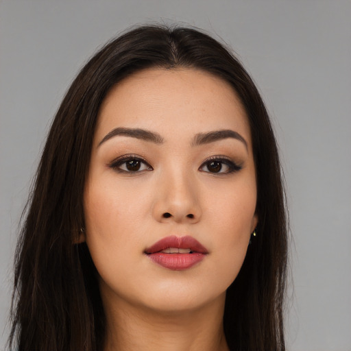Neutral asian young-adult female with long  brown hair and brown eyes