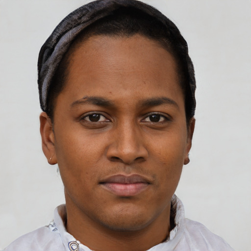 Neutral black young-adult female with short  brown hair and brown eyes