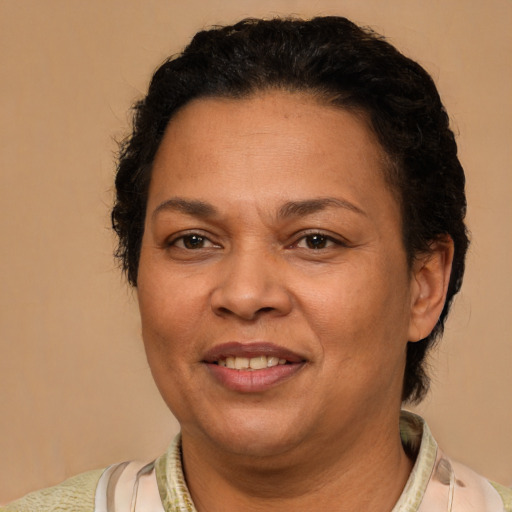 Joyful white adult female with short  brown hair and brown eyes