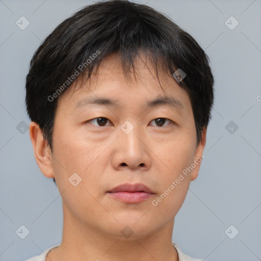 Neutral asian young-adult male with short  brown hair and brown eyes