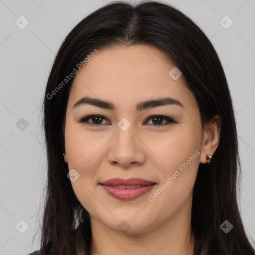 Joyful latino young-adult female with long  brown hair and brown eyes