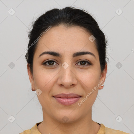 Joyful latino young-adult female with short  brown hair and brown eyes