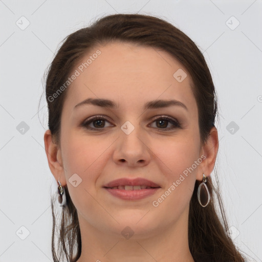 Joyful white young-adult female with long  brown hair and grey eyes