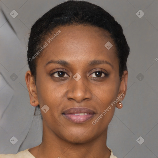 Joyful black young-adult female with short  brown hair and brown eyes