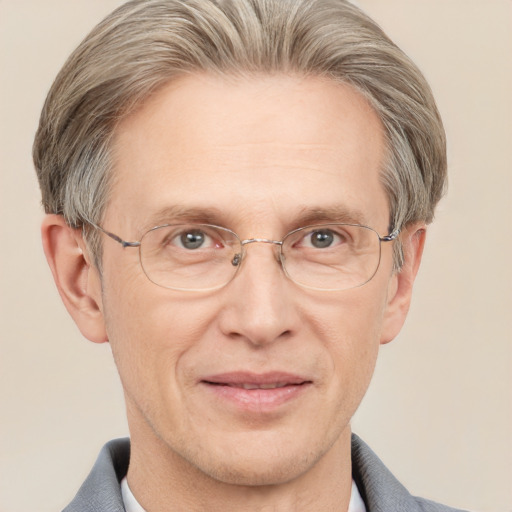 Joyful white middle-aged male with short  brown hair and grey eyes