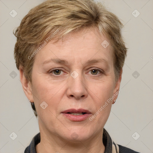 Joyful white adult female with short  brown hair and grey eyes