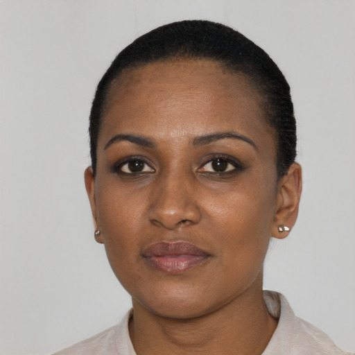 Neutral black young-adult female with short  black hair and brown eyes