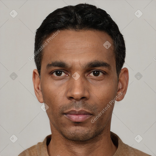 Neutral latino young-adult male with short  black hair and brown eyes
