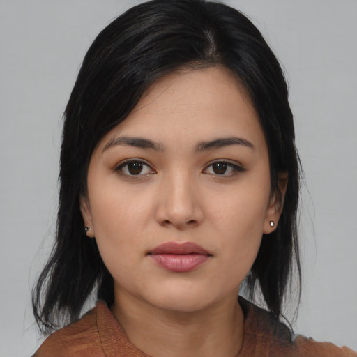 Joyful asian young-adult female with medium  black hair and brown eyes