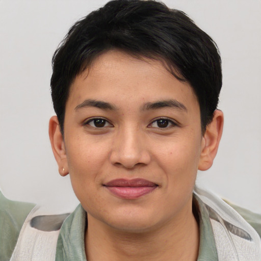 Joyful asian young-adult female with short  black hair and brown eyes