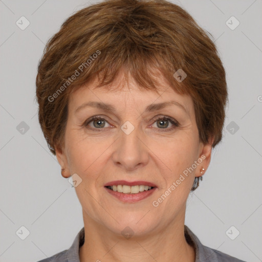 Joyful white adult female with short  brown hair and grey eyes