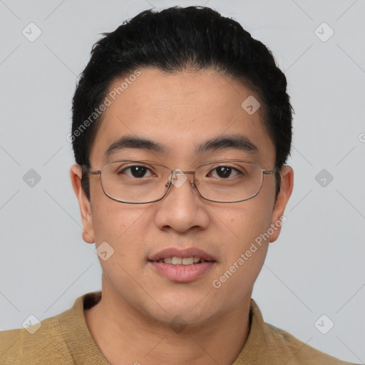 Joyful asian young-adult male with short  brown hair and brown eyes