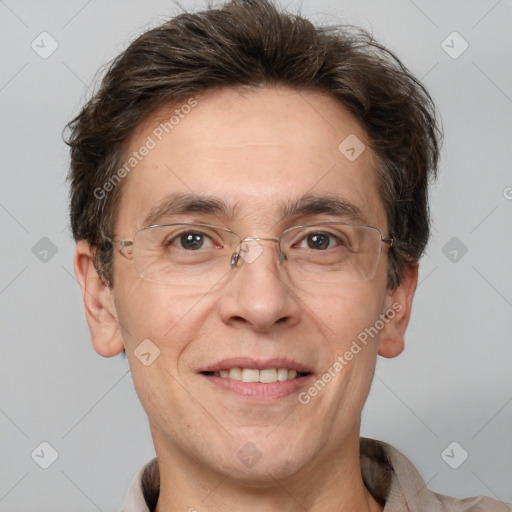 Joyful white adult male with short  brown hair and grey eyes