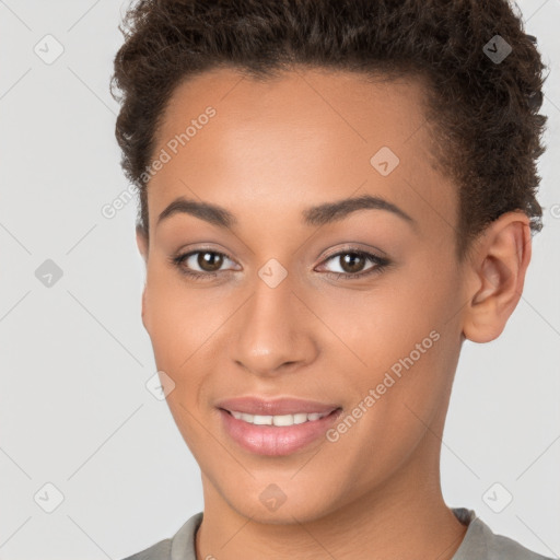 Joyful white young-adult female with short  brown hair and brown eyes