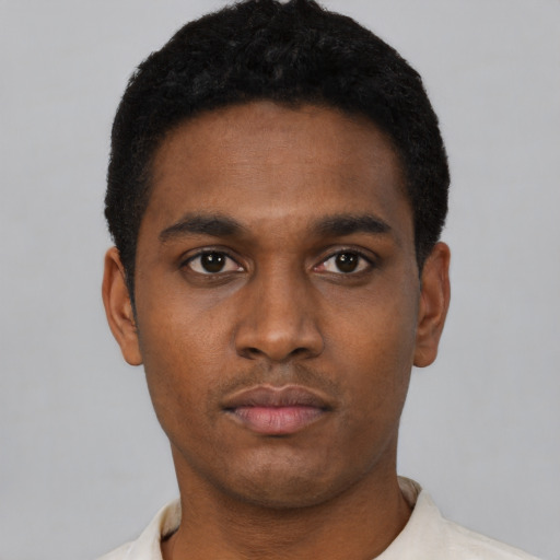 Neutral black young-adult male with short  black hair and brown eyes