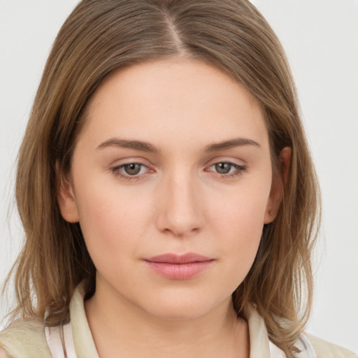 Neutral white young-adult female with medium  brown hair and brown eyes