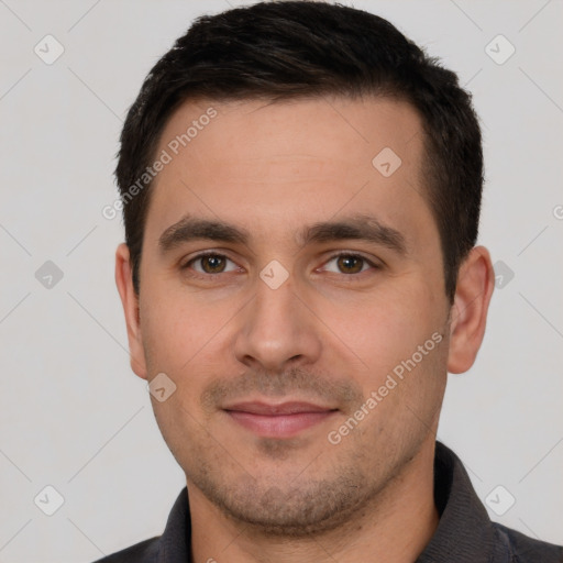 Joyful white young-adult male with short  brown hair and brown eyes