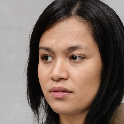 Neutral asian young-adult female with long  black hair and brown eyes