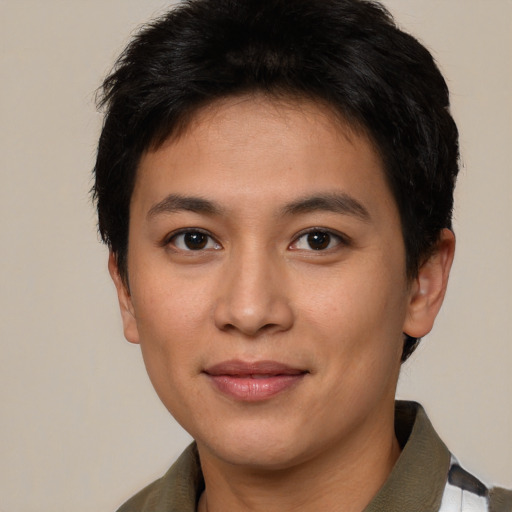 Joyful asian young-adult female with short  black hair and brown eyes
