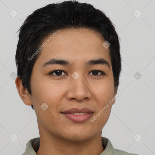 Joyful asian young-adult male with short  black hair and brown eyes