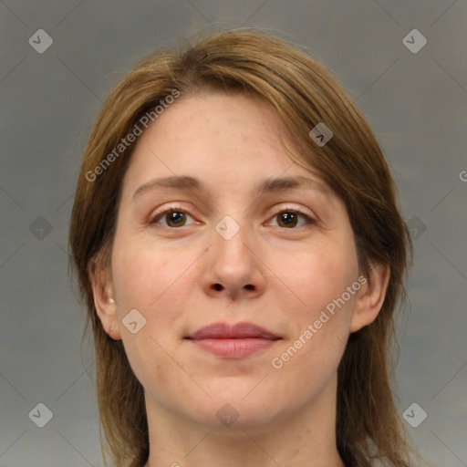 Joyful white adult female with medium  brown hair and brown eyes