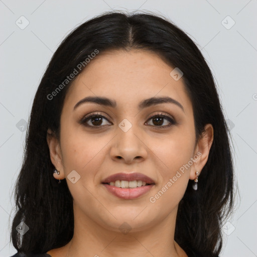 Joyful latino young-adult female with long  brown hair and brown eyes