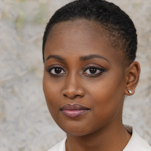 Neutral black young-adult female with short  brown hair and brown eyes