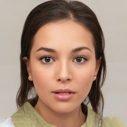 Neutral white young-adult female with medium  brown hair and brown eyes