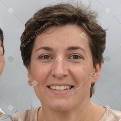 Joyful white adult female with short  brown hair and brown eyes