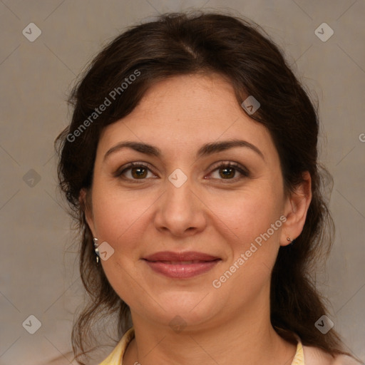 Joyful white adult female with medium  brown hair and brown eyes