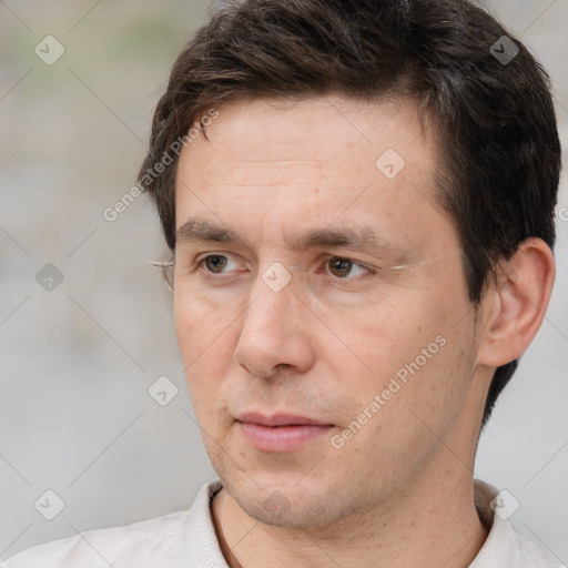 Neutral white adult male with short  brown hair and brown eyes