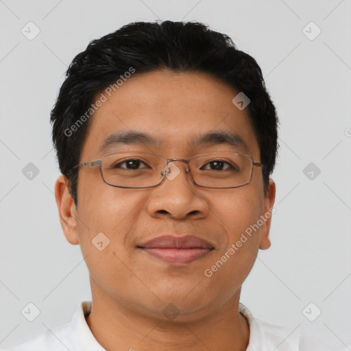 Joyful asian young-adult male with short  brown hair and brown eyes