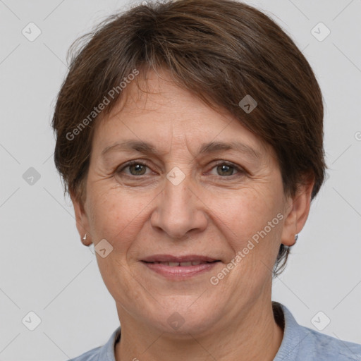 Joyful white adult female with short  brown hair and brown eyes