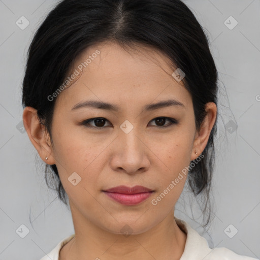 Joyful asian young-adult female with medium  brown hair and brown eyes