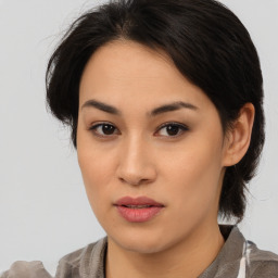 Neutral asian young-adult female with medium  brown hair and brown eyes