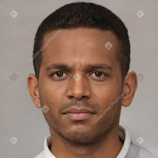 Neutral latino young-adult male with short  brown hair and brown eyes
